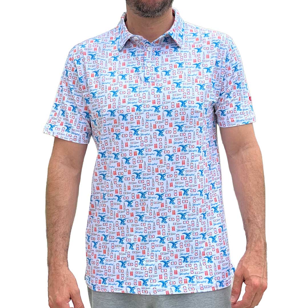 Man wearing Yuengling repeat pattern polo with logo, beer bottles and since 1829.
