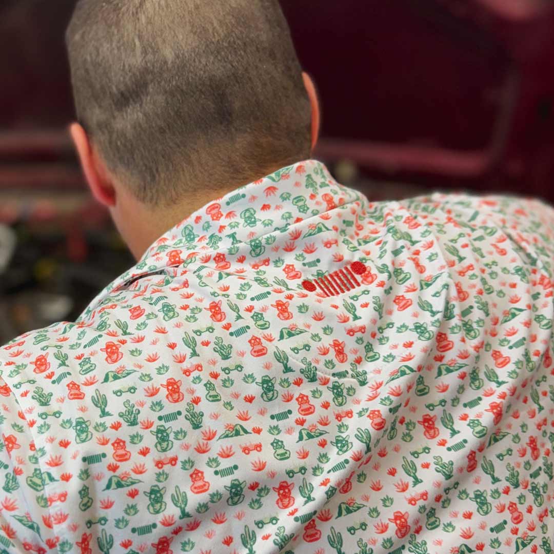 back of man wearing Jeep duck and cactus polo with embroidered Jeep grille accent