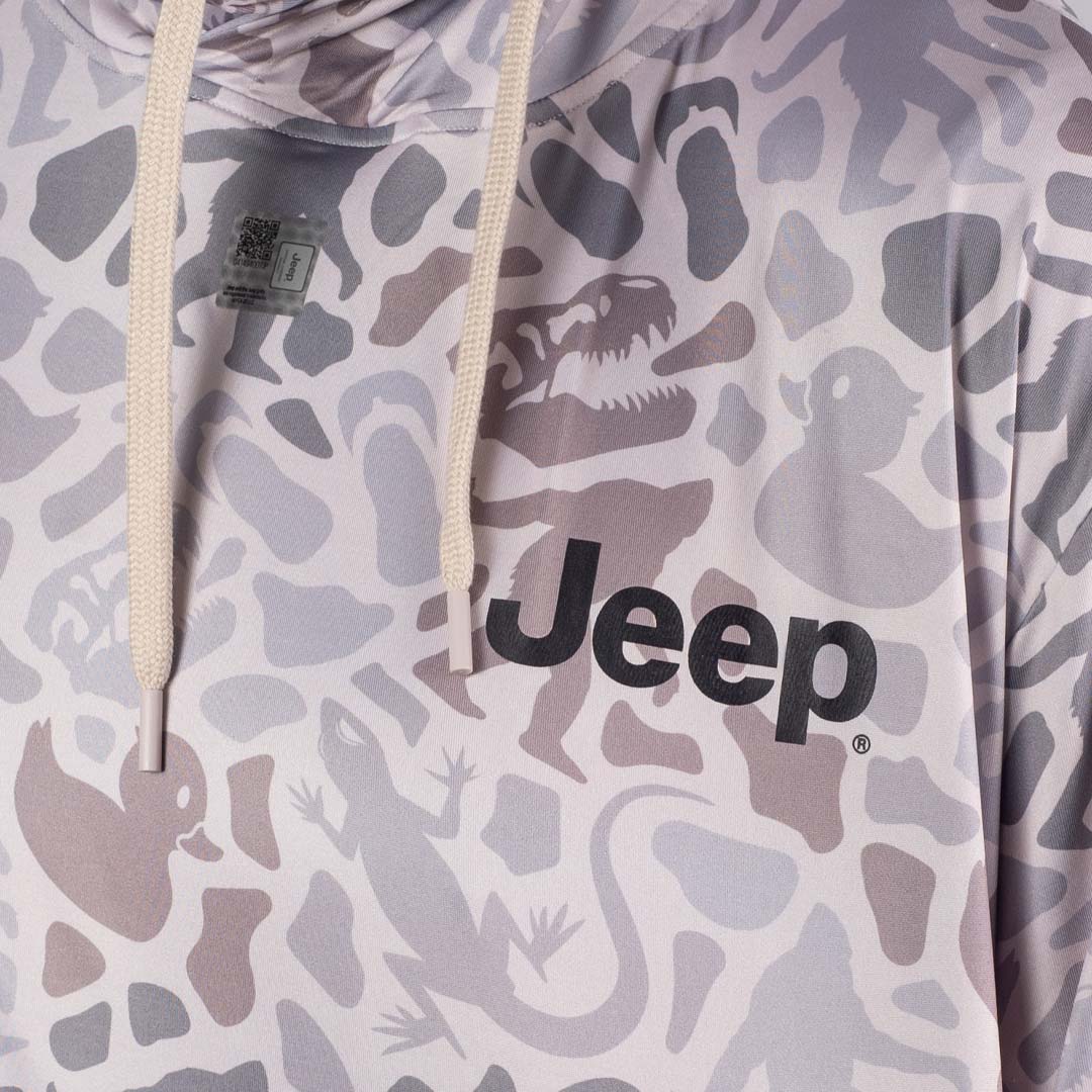 Person wearing a camouflage Jeep Easter Egg Performance hoodie with Jeep logo on the left chest. Zoom in shot.