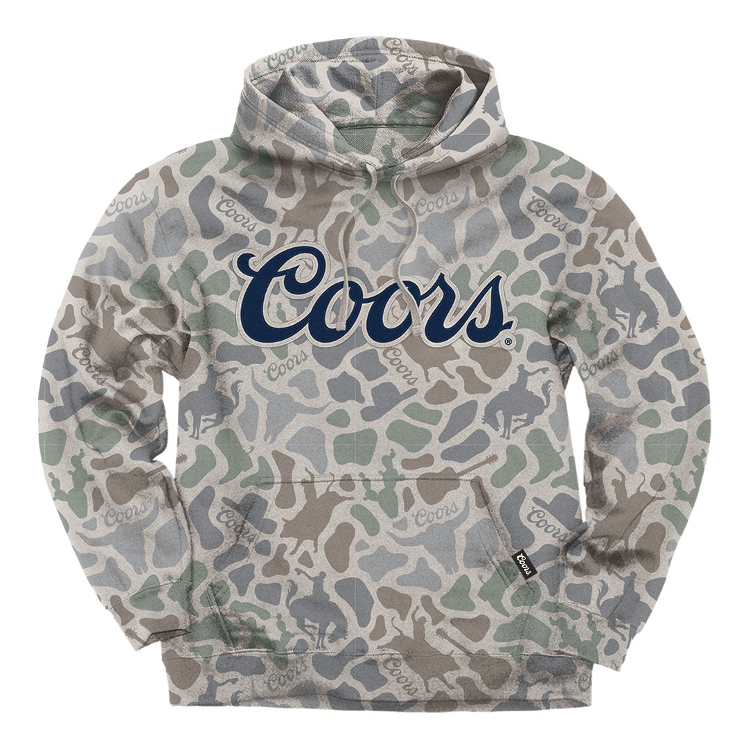 A Coors-branded pullover hoodie featuring a green, gray, and beige camouflage pattern with the 'Coors' logo printed across the chest in navy blue.