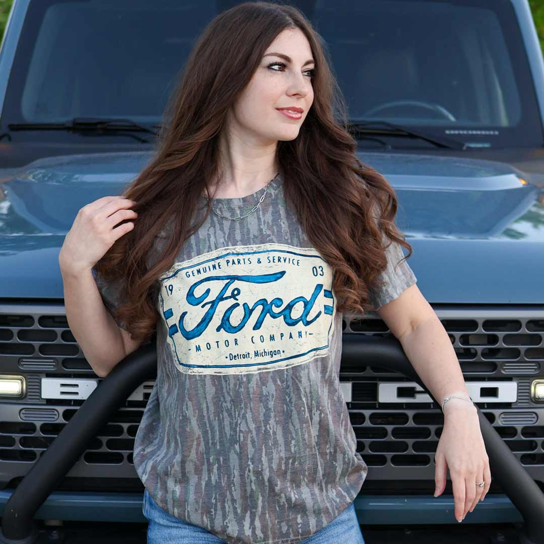Woman wearing a camo Ford t-shirt