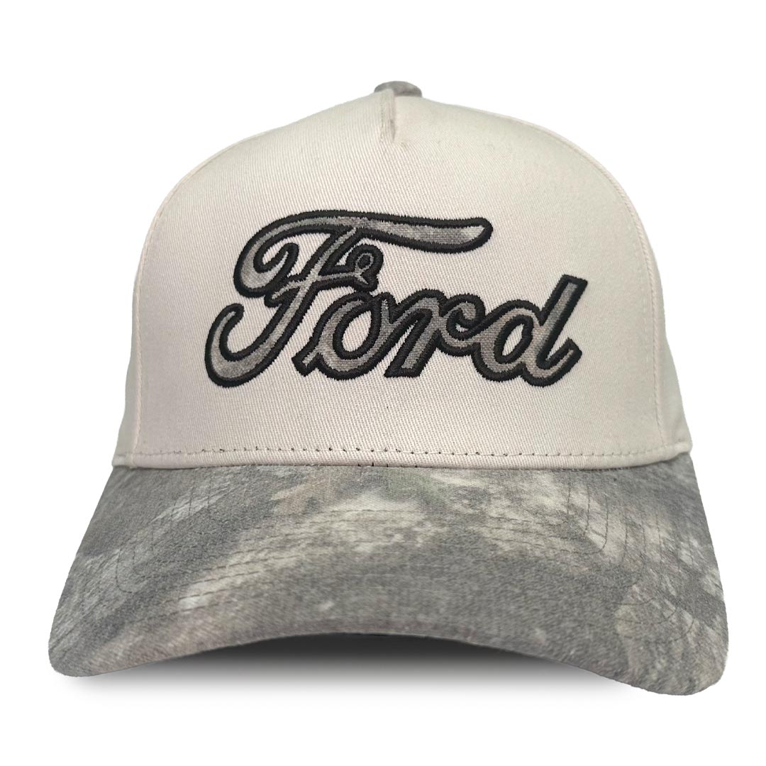 A baseball cap with an off-white crown and a gray camouflage-patterned visor, featuring an embroidered black and gray 'Ford' logo on the front.