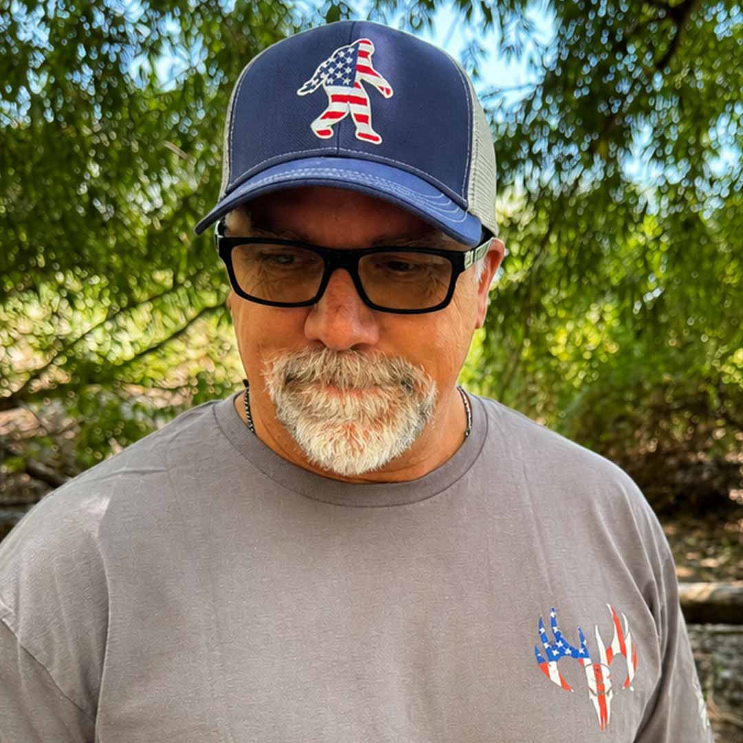 Man wearing Buck Wear Freedom Squatch Hat