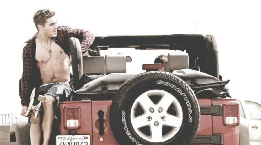 Hot male exiting from his jeep