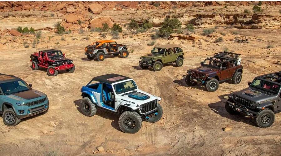 Bunch of jeeps in a sandy area