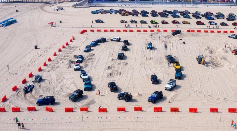 Jeeps on a beach course