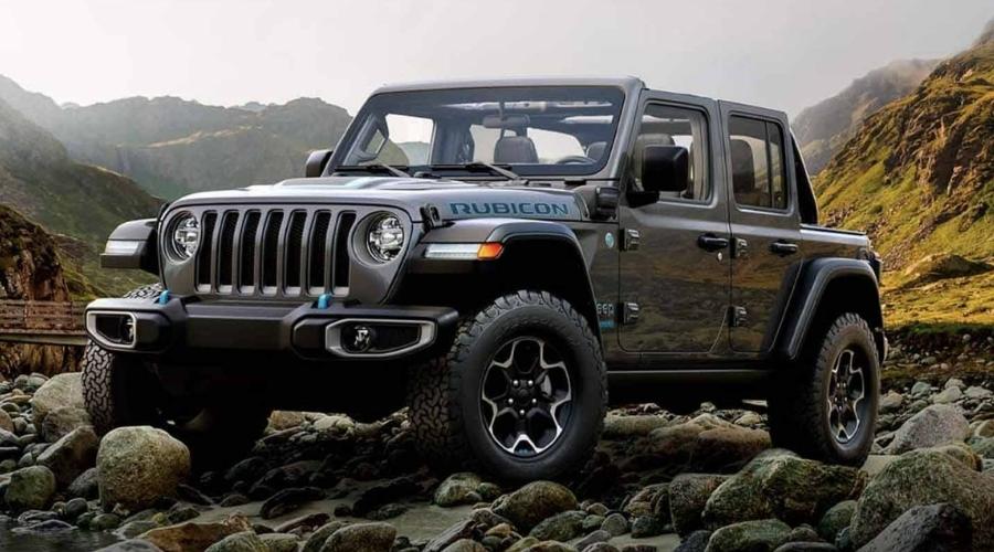 Green open top jeep on the mountain