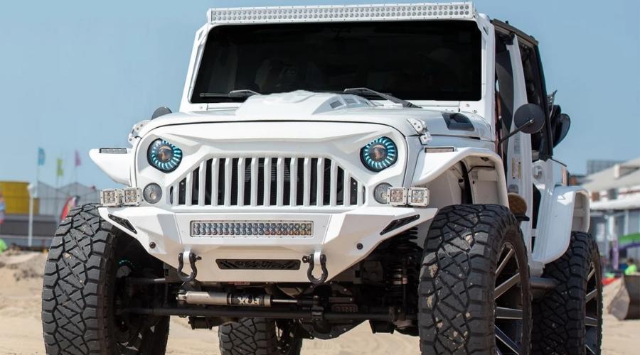 white modded jeep with frowning looking face