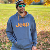 Man wearing Jeep vintage hoodie with embroidered orange jeep logo on front