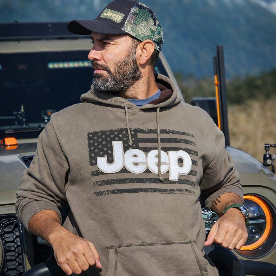 Man wearing Jeep hoodie with American flag