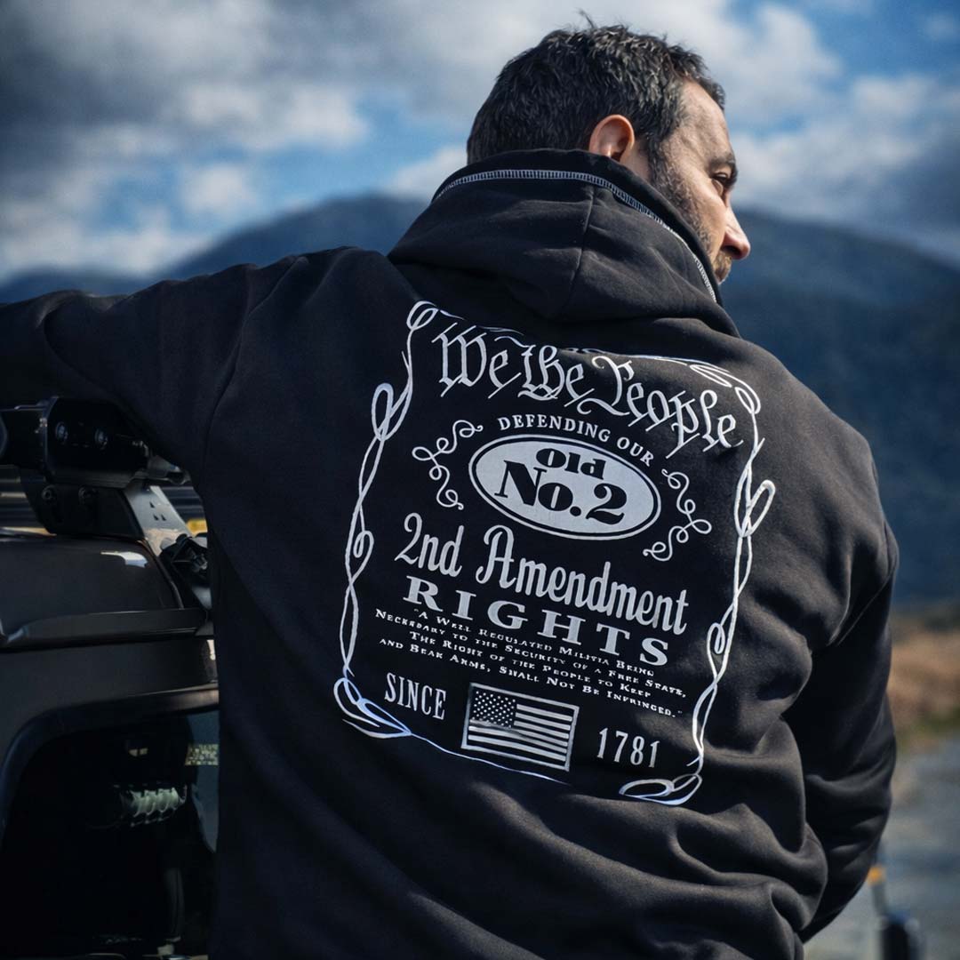 man wearing a black patriotic hoodie