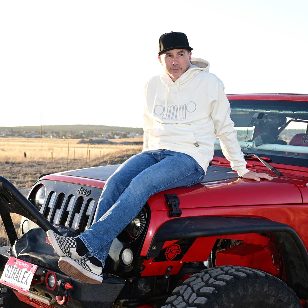 male wearing white jeep hoodie with jeep grille on it