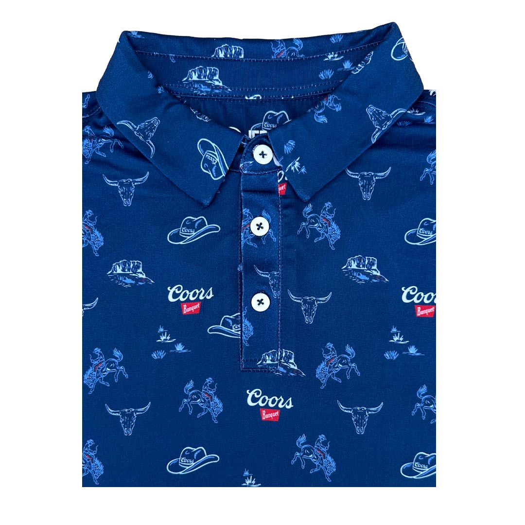 Folded blue polo with Coors logo repeat pattern and graphics on a white background