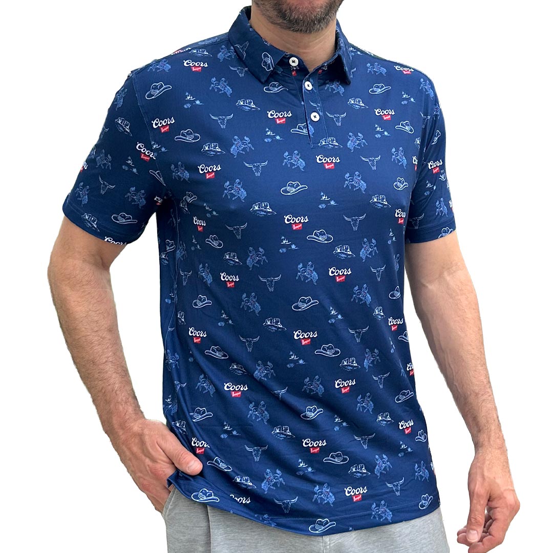 Man wearing a blue polo with Coors logo repeat pattern and graphics on a white background
