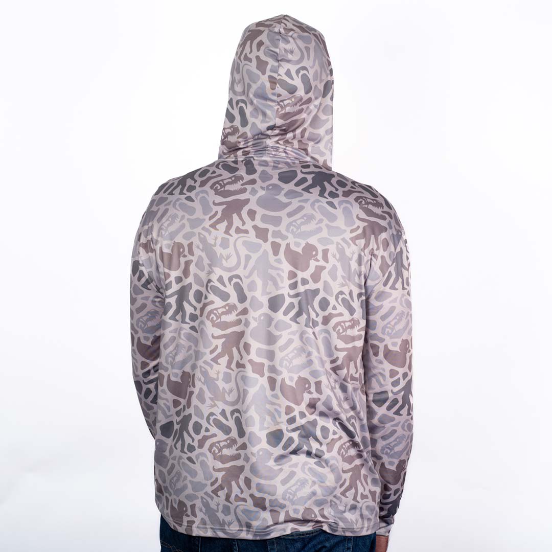 Person wearing a camouflage Jeep Easter Egg Performance hoodie with Jeep logo on the left chest. White background. Back.