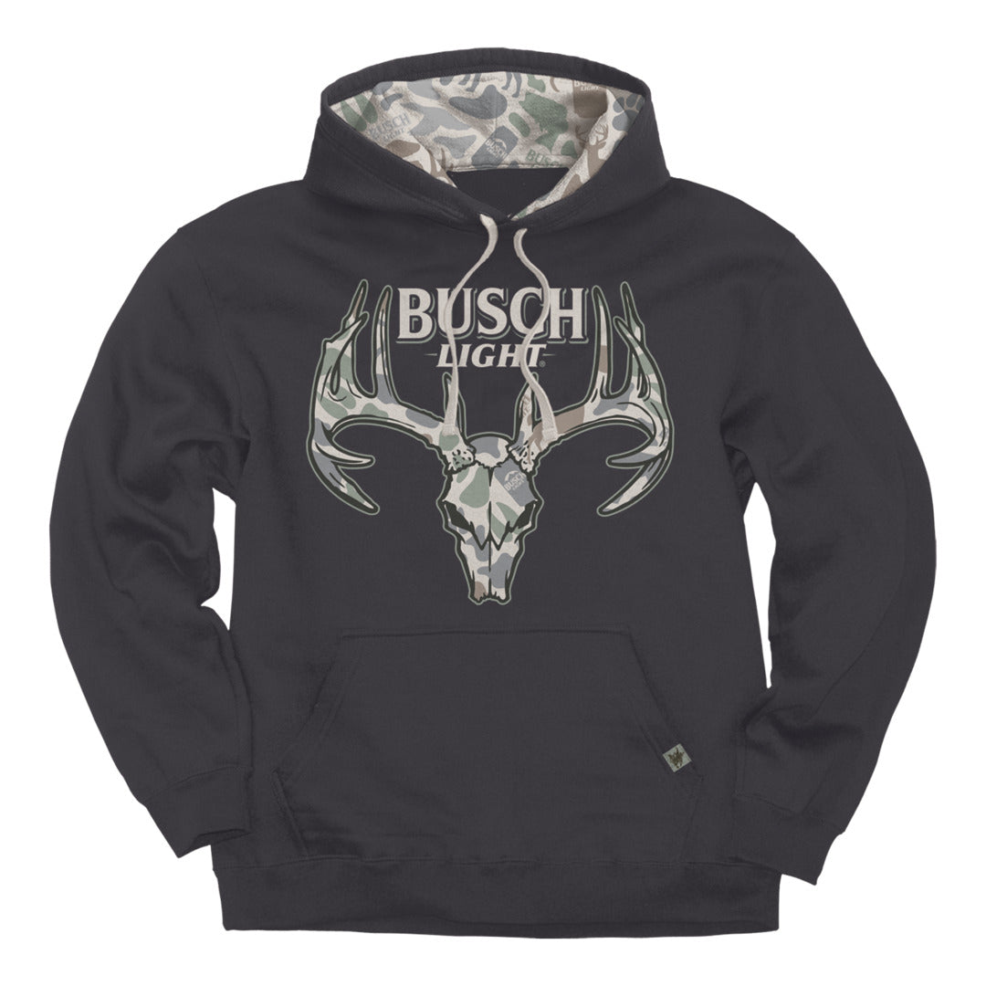 A dark charcoal gray pullover hoodie featuring a large front graphic of a deer skull with antlers and the text 'BUSCH LIGHT' in white and gray. The hoodie has a camouflage pattern lining the inside of the hood and a kangaroo pocket on the front.