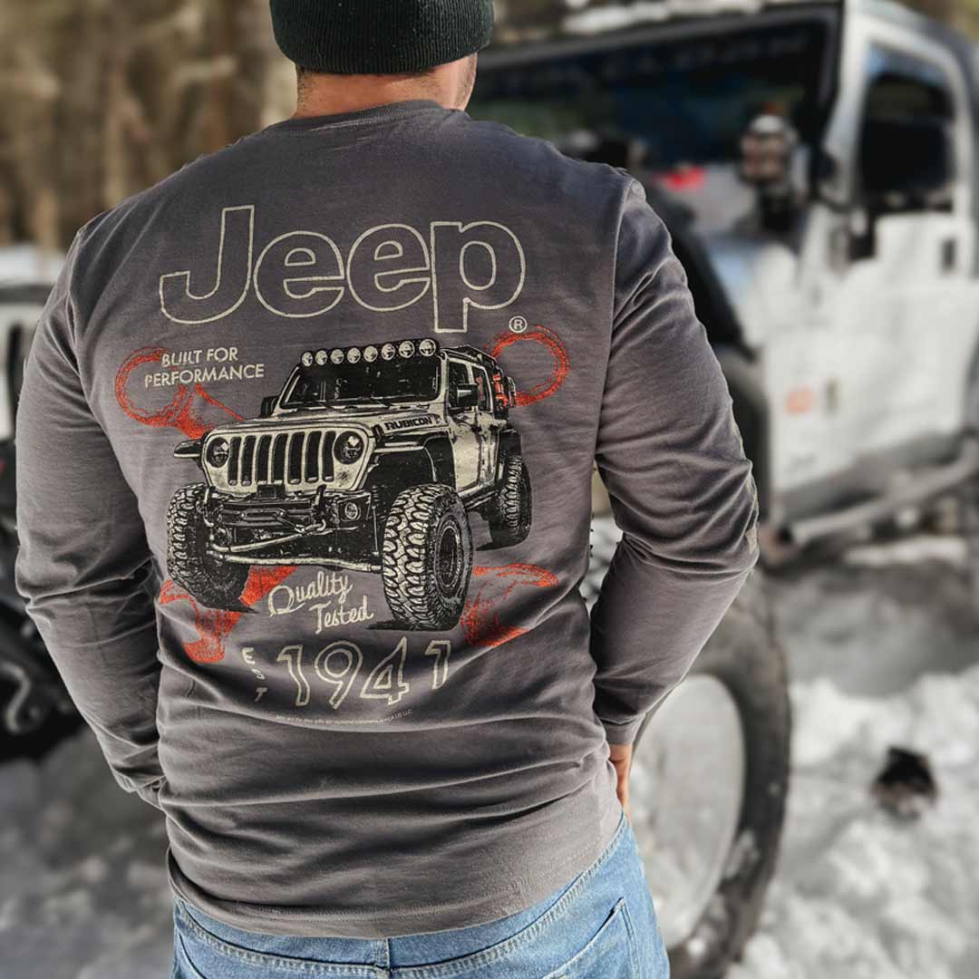 Man wearing a gray long sleeve Jeep t-shirt 