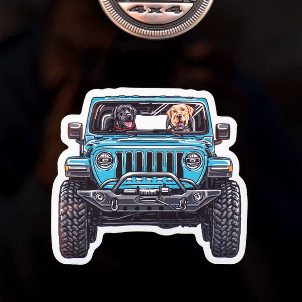 Jeep sticker with dogs driving a blue jeep lifestyle photo