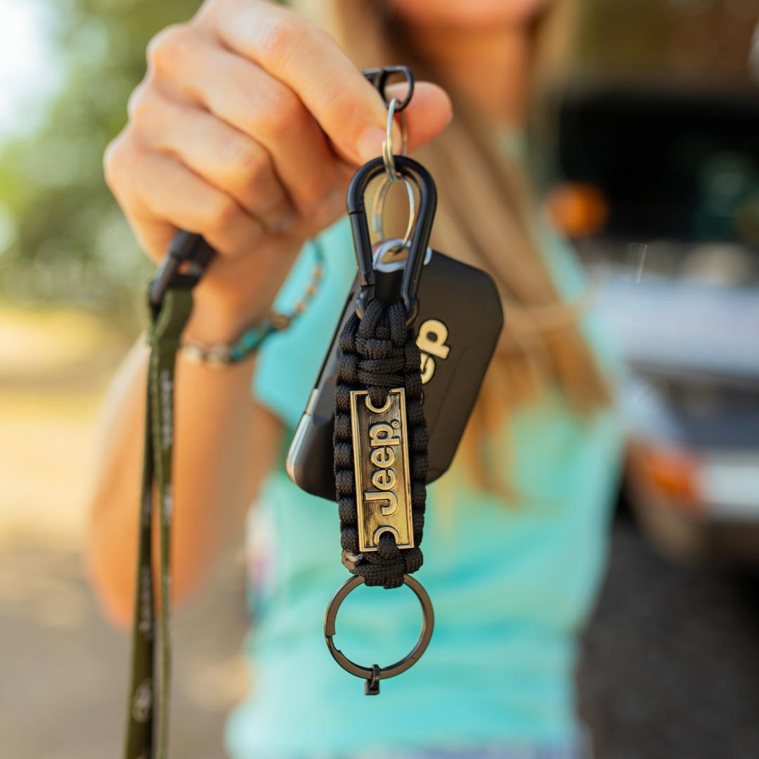 womens holding Jeep keychain