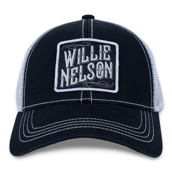 Front of the willie nelson black patch trucker hat